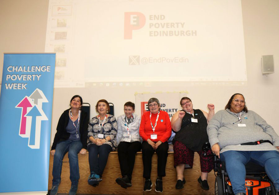 End Poverty in Edinburgh Conference attendees sitting on the stage.